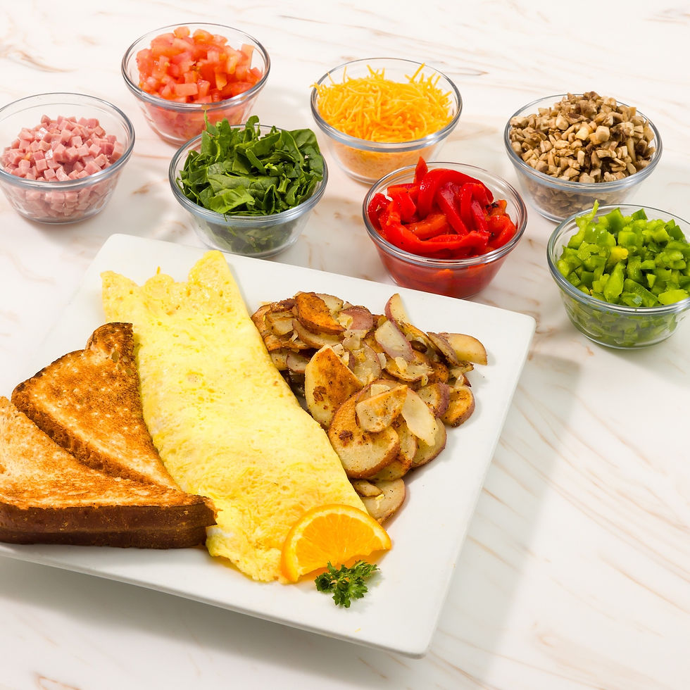 Keke's omelet on plate with toast and home fries. Various ingredients in bowls on the side.